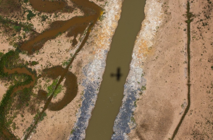 An aerial photograph of a part of the Cantareira water system shows how low the water levels of this important water source are. (Image from theguardian.com.)